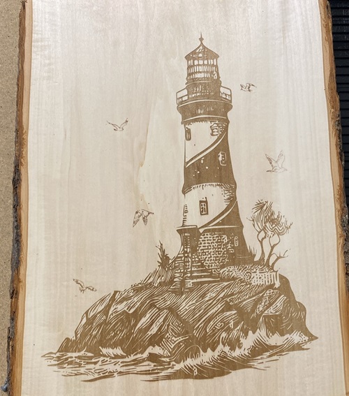 Lighthouse on live edge pine